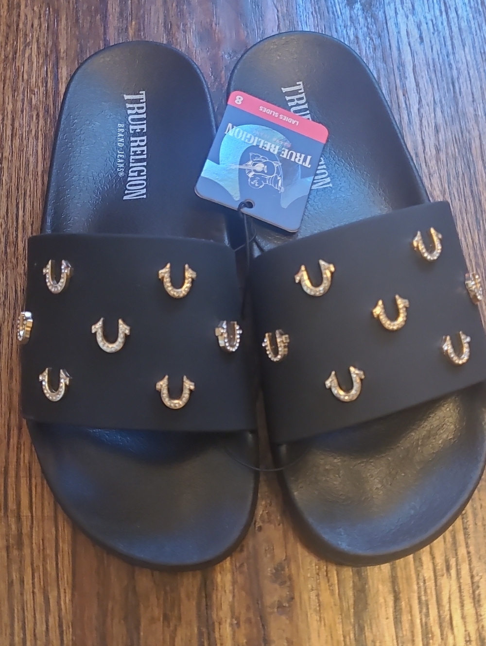 True Religion Black Slide Sandals with Gold Tone Horseshoe Studs - Size 8